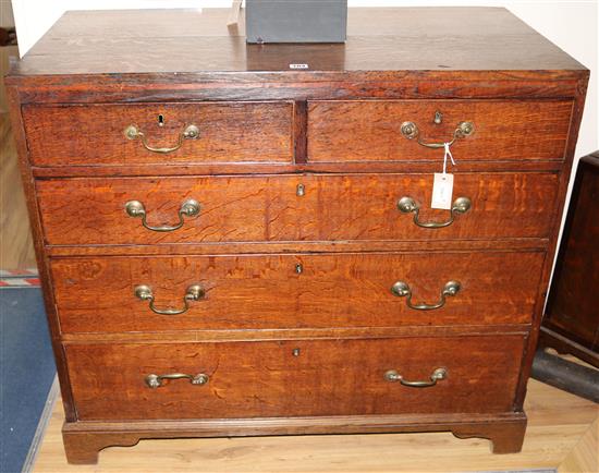 A George III oak chest of drawers, W.102cm